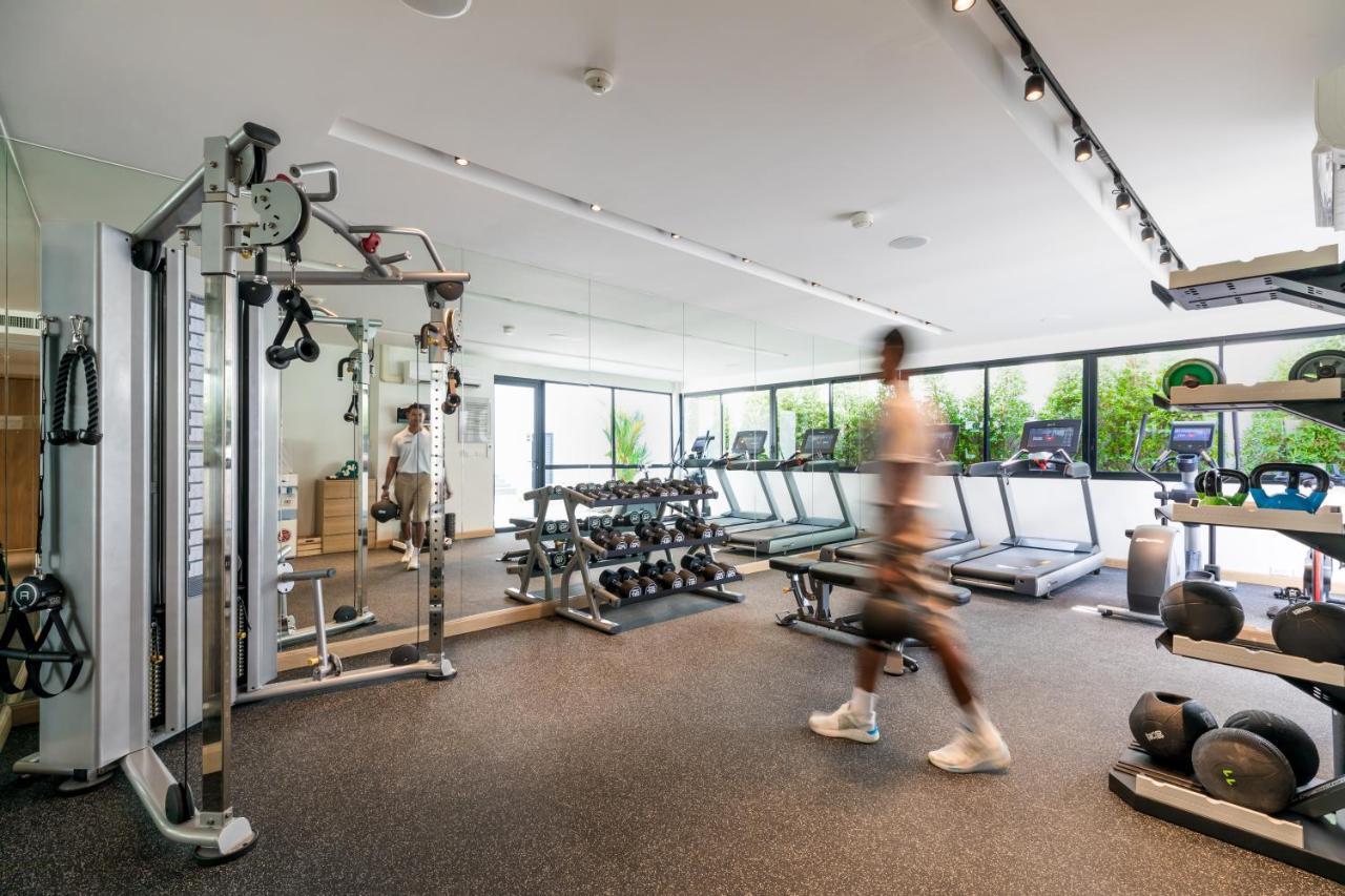 Outrigger Surin Beach Resort - Sha Extra Plus Kültér fotó The gym at the 100 Queen's Gate