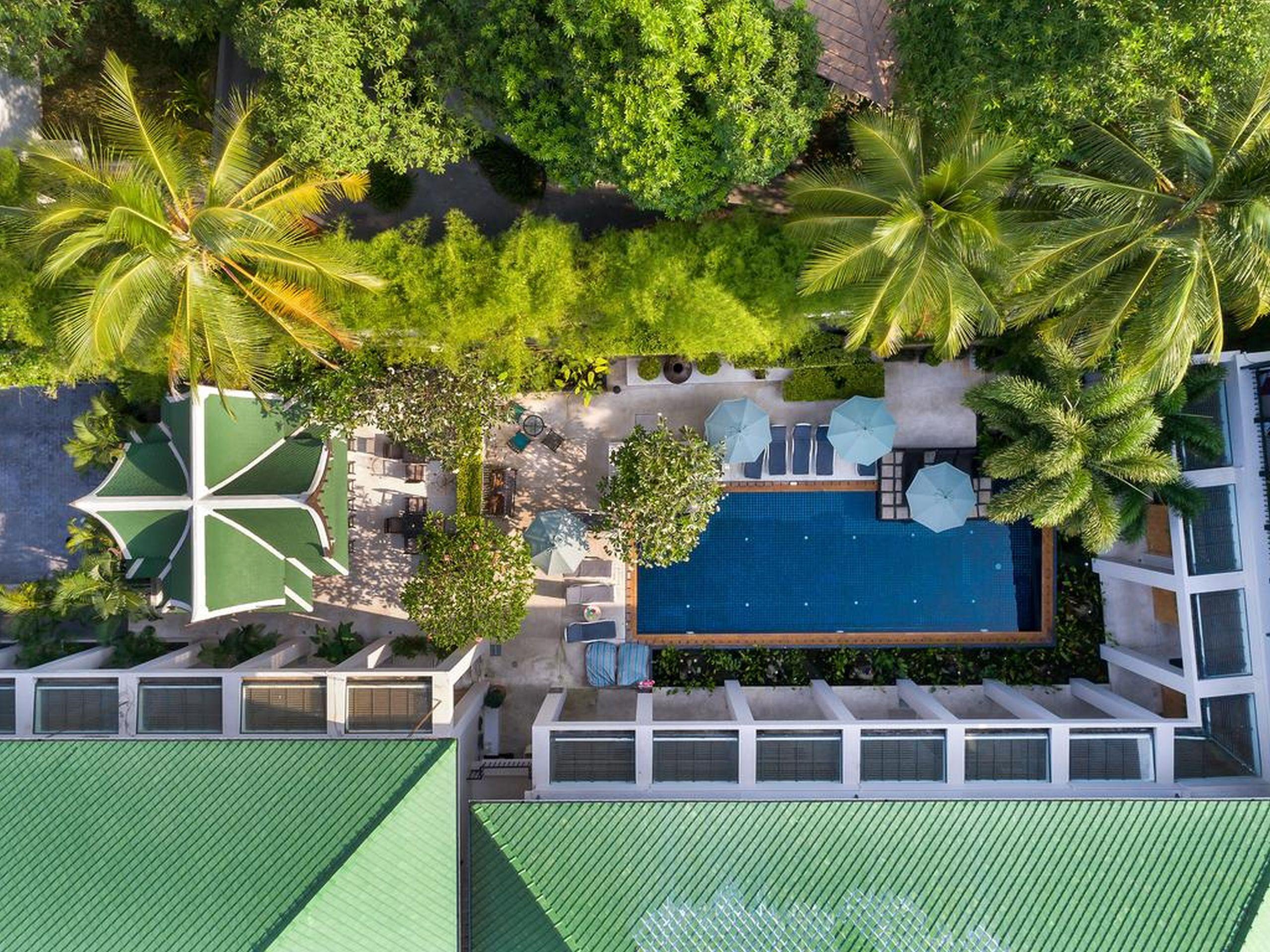 Outrigger Surin Beach Resort - Sha Extra Plus Kültér fotó Aerial view of the hotel