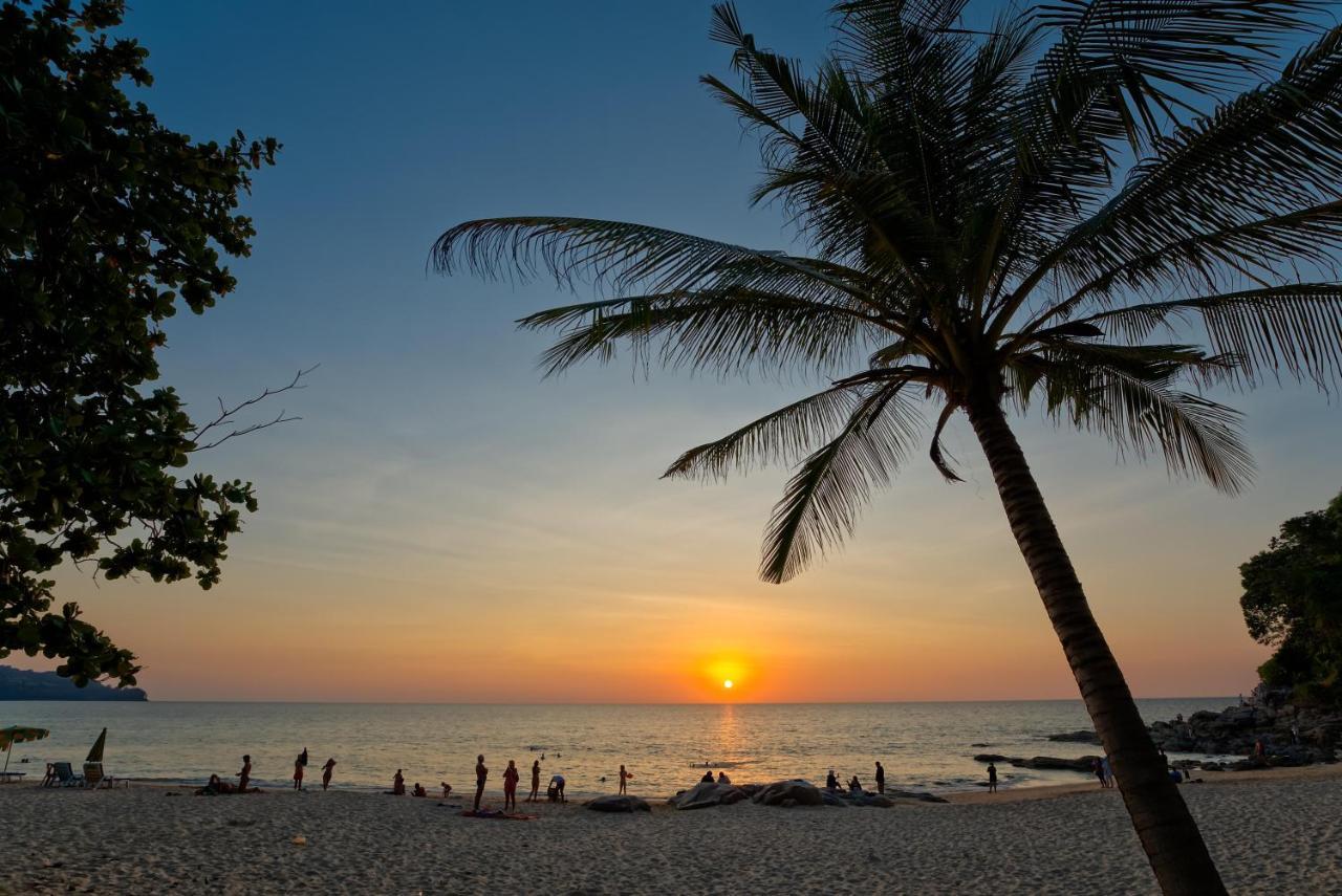 Outrigger Surin Beach Resort - Sha Extra Plus Kültér fotó Sunset at Tanjung Puteri Beach