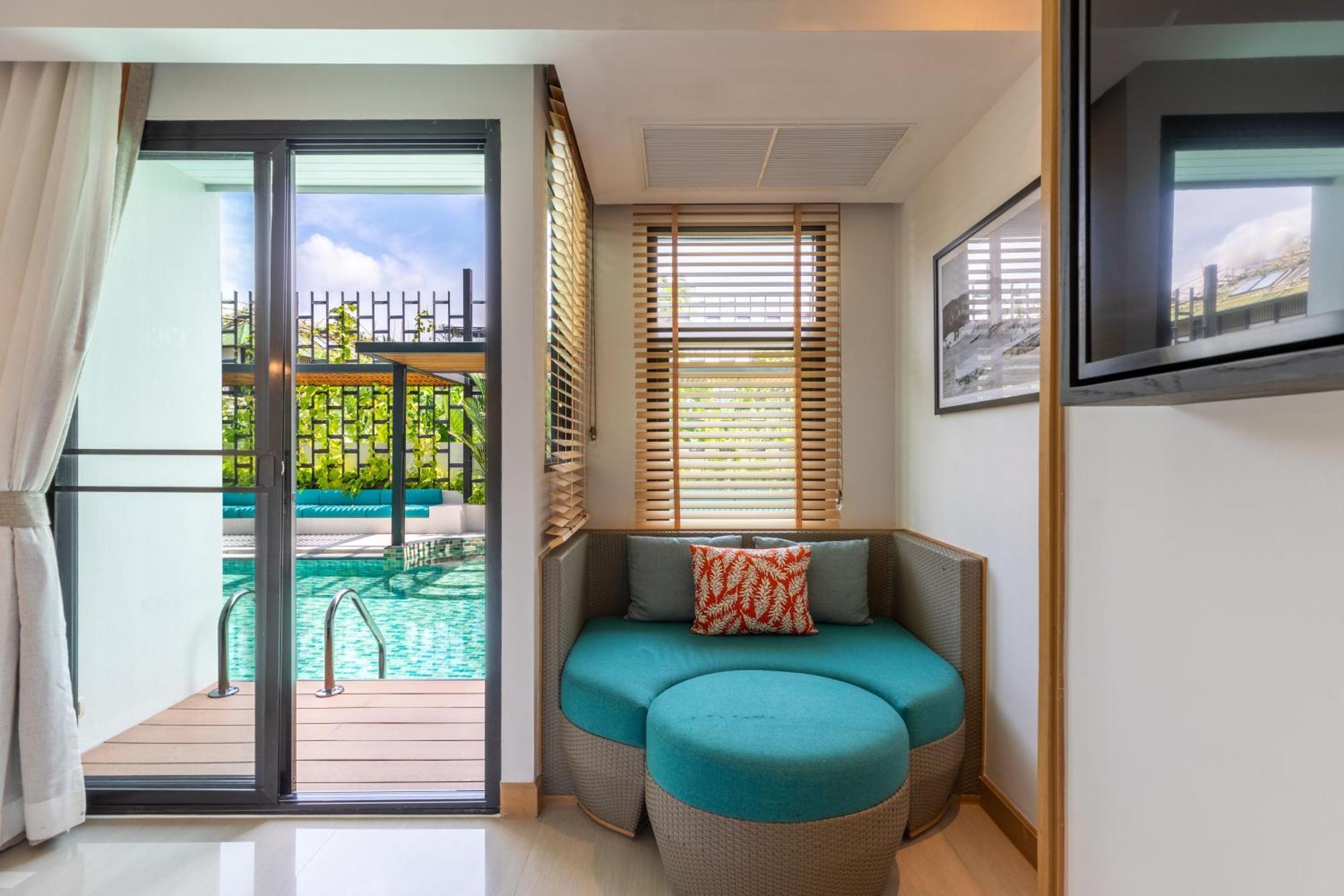 Outrigger Surin Beach Resort - Sha Extra Plus Szoba fotó A room at the hotel
